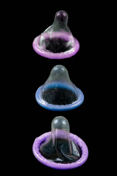 Assortment Condoms Close Plain Background — Stock Photo, Image