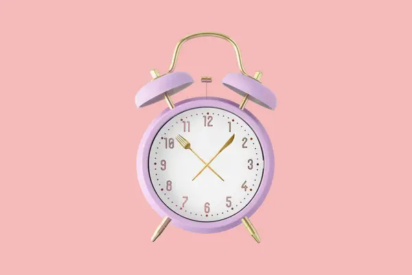 Violet retro style alarm clock with golden fork and knife as hour hands isolated on pink background. Time for food. Meal on  time concept.