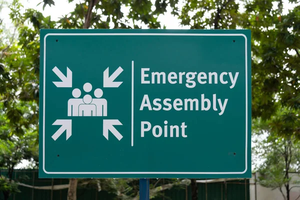 stock image Emergency assembly point sign in the park.