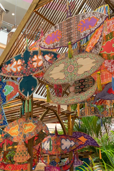 stock image Kuala Lumpur,Malaysia - April 21,2023 : Traditional Colourful Malay Wau kites and decorations at the wau-themed kampung during Hari Raya at Mid Valley Megamall.