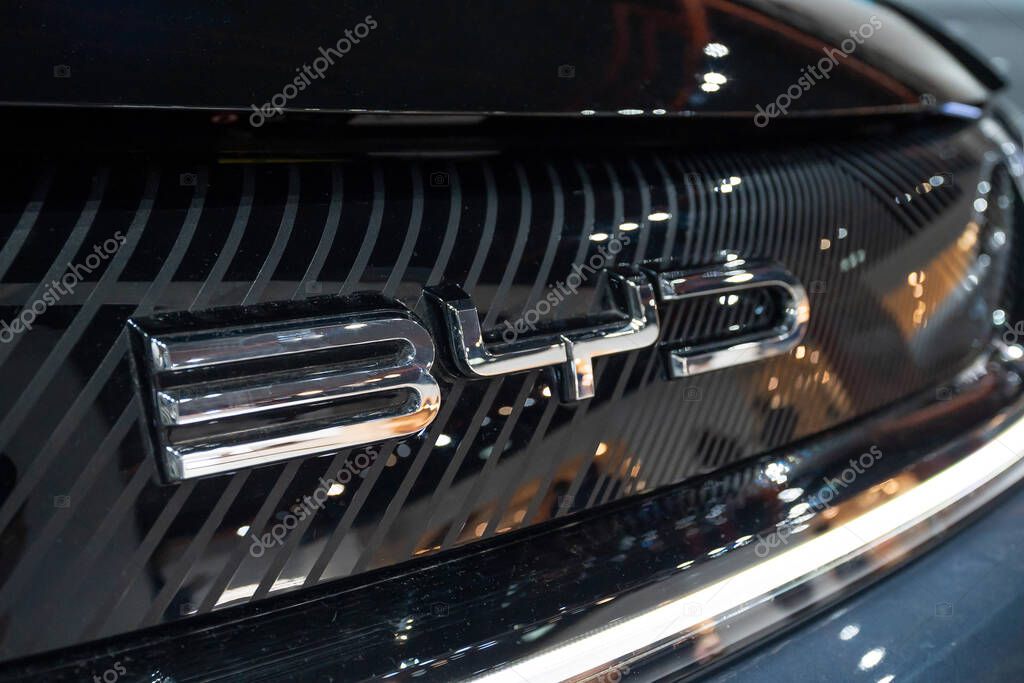 Kuala Lumpur, Malaysia - March 11,2024 : Close-up view of the BYD logo on the BYD Dolphin electric vehicle.