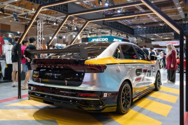 Serdang, Malaysia - May 24,2024 : Proton displaying a S70 R3 at the Malaysia Autoshow 2024 in MAEPS, Serdang, marking Proton R3's first all-new racing car since the Proton Saga R3 in 2019. clipart