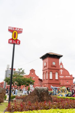 Malacca, Malaysia - Sept 21,2024 : Zero Mile point of Melaka City. People can seen exploring around it. clipart