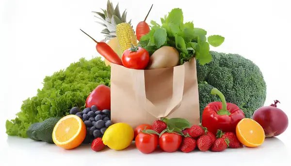 Delivery healthy food background. Healthy vegan vegetarian food in paper bag vegetables and fruits on white, copy space, banner. Shopping food supermarket and clean vegan eating.