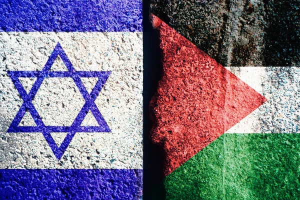 stock image Flags of Israel and Palestine painted on cracked wall background Israel - Palestinian conflict concept