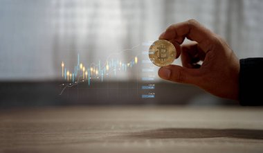 Bitcoin altın sikke ve ufuk grafik arka planı.