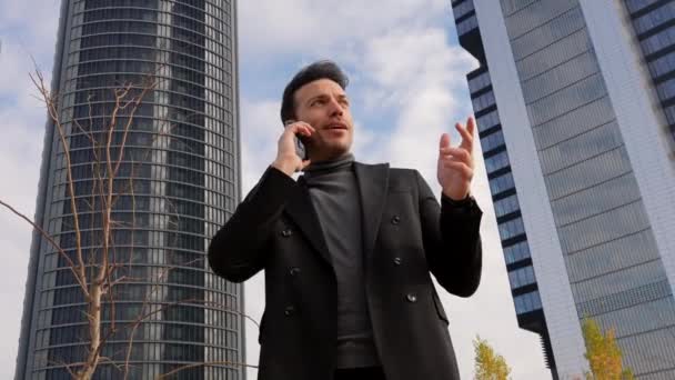 Corporate Portrait Caucasian Businessman Talking Phone Next Skyscraper Office — Videoclip de stoc