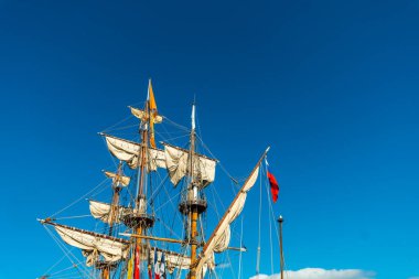 Itsas Festibala Festival, Pasajes, Gipuzkoa, Spain. Masts of traditional wooden sailing ships docked in the port for tourism