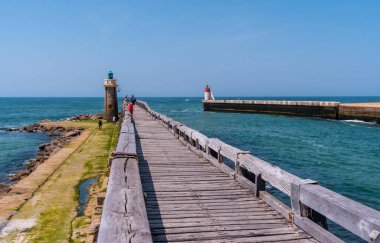 Capbreton village on the coast of the French Basque Country, wooden walkway by the sea, France clipart