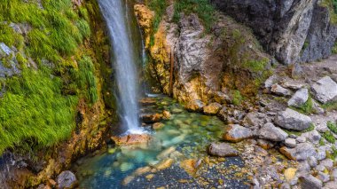 The Grunas waterfall in Theth National Park, Albania. Albanian alps clipart