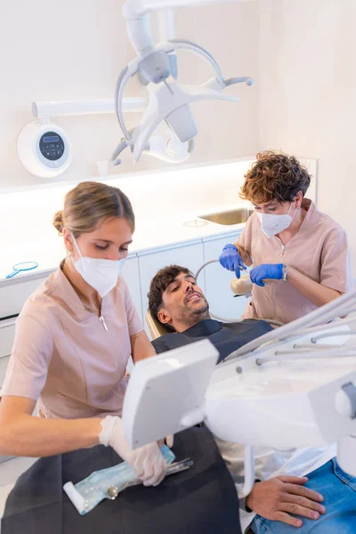 Man Lying Dental Chair While Checking Teeth Dentist Office — Stock Photo, Image