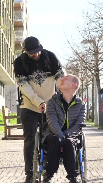 Disabled Person Walking Friend Wheelchair Street — Wideo stockowe