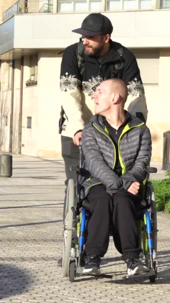 Disabled Person Walking Having Fun Friend Wheelchair Street — Vídeo de Stock