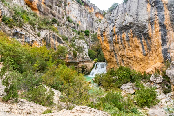 Landscape of the waterfall on the Vero River walkway path in Alquezar. Pyrenees