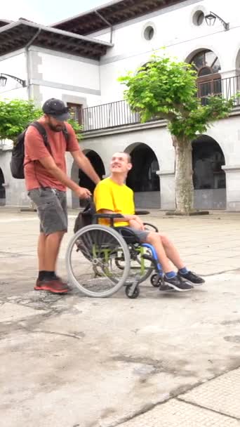 Disabled Person Wheelchair Walking Town Square Friend — Stok video