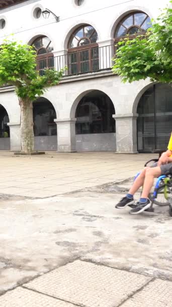 Disabled Person Wheelchair Walking Town Square Friend — Stok video