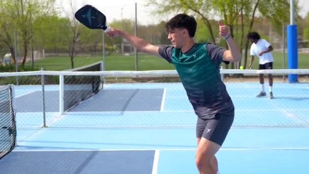 Full Length Photo Young Man Hitting Ball Playing Pickleball Outdoors — Stock Video