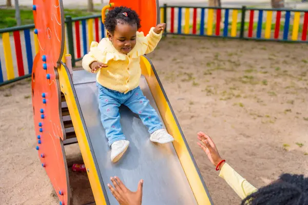 Elevated View Cute African Girl Playing Her Mother Slide — Stock Photo, Image