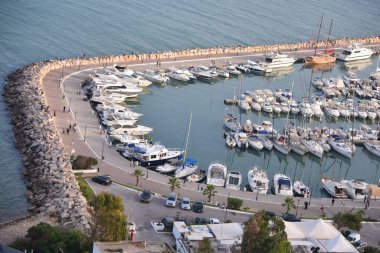 Port with yachts and ships in Sidi Bou Said. Copy space, wallpaper seascape background. Mediterranean, Tunisia