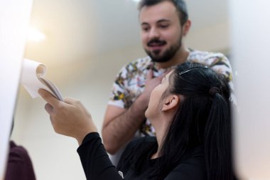 Young people in programming school.Students Learning In A Programing Class