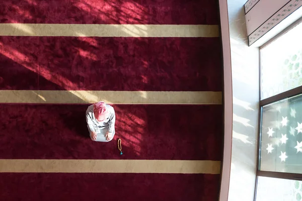 stock image Arabic Muslim Man Making Traditional Prayer To God While Wearing traditonal arabic clothes during ramadan