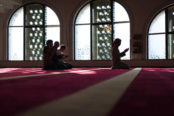 Ramadan praying, Islamic concept. Salah, worship and pray with islamic friends at ramadan
