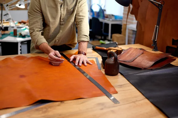 stock image skilled tailor cobbler working with textile in workshop.close up cropped shot, profession, occupation. interest