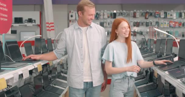Smiling Happy Couple Enjoying Choosing Looking Laprop Process Store Blonde — Stock Video