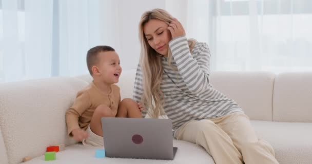 Happy Mother Nanny Adorable Kid Son Use Laptop Watch Cartoons — Stock Video