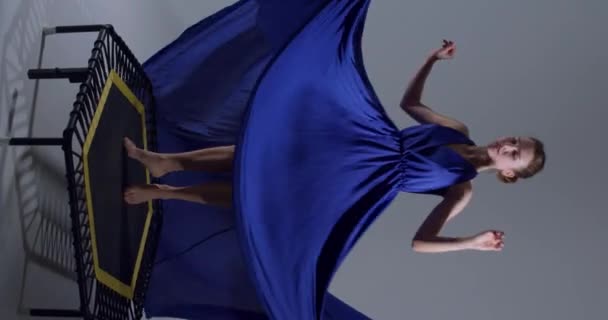 Beautiful Dancer Long Evening Blue Dress Jumping Trampoline Creative Art — Stock Video