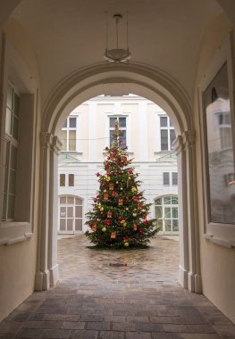 Festively decorated Christmas tree at Palais Daun-Kinsky, Vienna, Austria, December 3, 2024 clipart