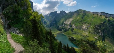 Wonderful hike in the Alpstein mountains from Wasserauen to Meglisalp in Appenzellerland Switzerland clipart