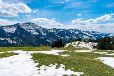 Beautiful panoramic circular hiking trail to the Denneberg at the Nagelfluhkette in the Allgau near Oberstaufen Steibis clipart