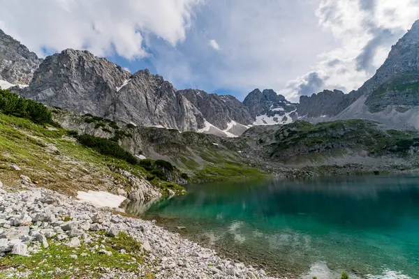 stock image Panoramic mountain tour in Ehrwald via the Tajatorl to Drachensee, Coburger Hut and Seebensee in the Tiroler Zugspitz Arena