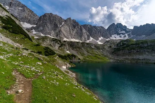 stock image Panoramic mountain tour in Ehrwald via the Tajatorl to Drachensee, Coburger Hut and Seebensee in the Tiroler Zugspitz Arena