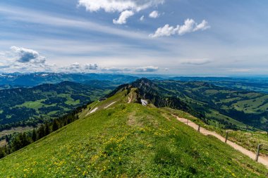 Mountain tour over the Brunnenauscharte to the Hochgrat on the Nagelfluhkette in the Allgau clipart