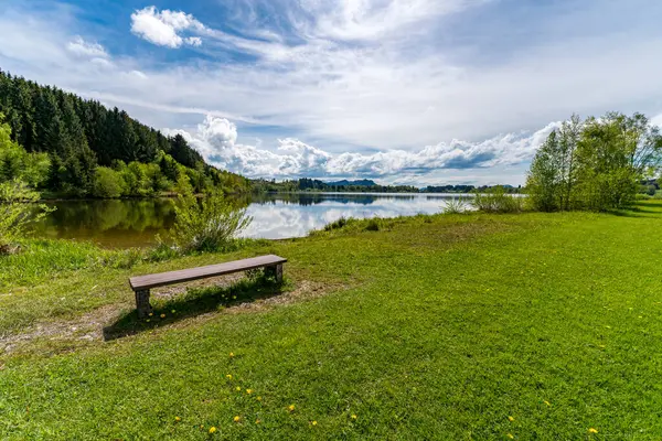 stock image Beautiful hike along the Rottachsee lake with ravine path to the Burgkranzegg ruins in the Allgau region