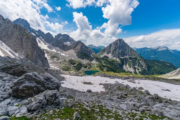 stock image Panoramic mountain tour in Ehrwald via the Tajatorl to Drachensee, Coburger Hut and Seebensee in the Tiroler Zugspitz Arena