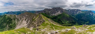 Mountain landscape of Allgau alps from a high viewpoint in Bad Hindelang Hinterstein in Bavaria clipart