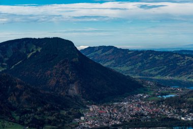 Explore the stunning autumn hues of the Allgaeu Alps with a view of Gruenten mountain near Burgberg and Immenstadt clipart