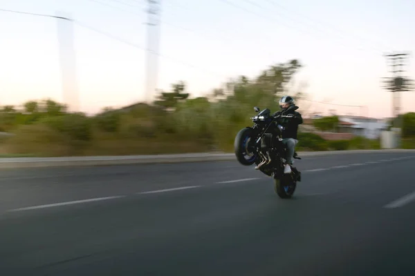 Motorbike Rider Doing Wheelie Road Evening — Stock Photo, Image