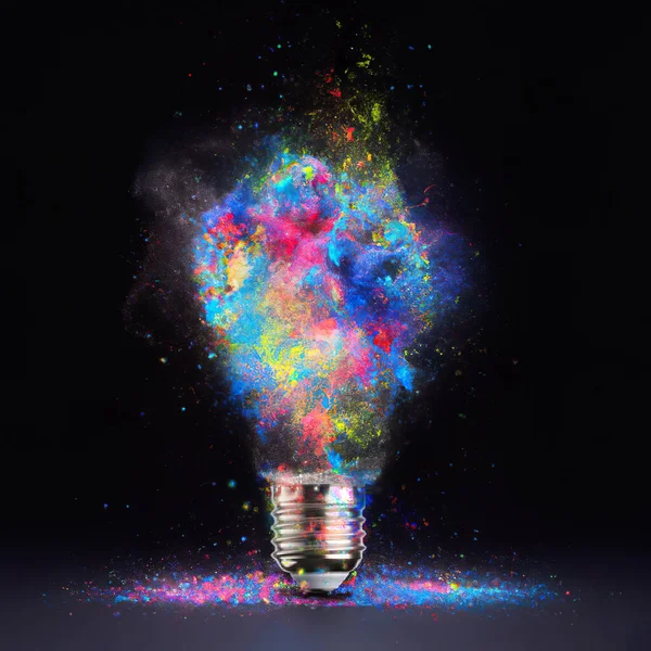 Light Bulb Shaped Colorful Powder Explosion Black Background — Stock Photo, Image