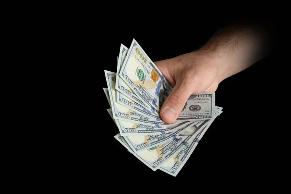 Siyah Arka Planda 100 Dolarlık Banknotlar Tutuyor — Stok fotoğraf