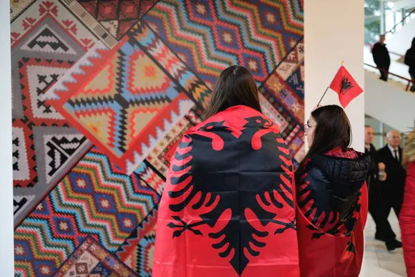 Tirana Albania November Two Women Backs Camera Wrapped Albanian Flags — Stock Photo, Image