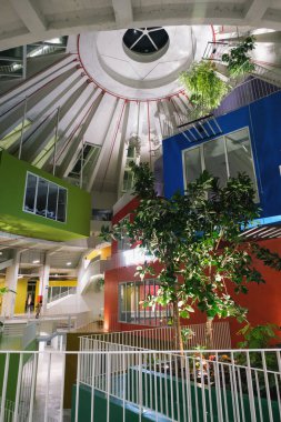 Tirana, Albania - November 28, 2023: Nighttime photograph of the TUMO center and its surroundings inside the Tirana Pyramid
