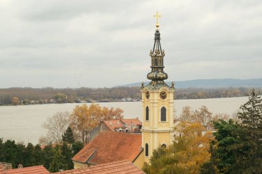 Belgrade, Serbia - December 3, 2023: An overcast view captures the varied urban landscape, punctuated by the iconic Zemun Tower and distant church spires clipart