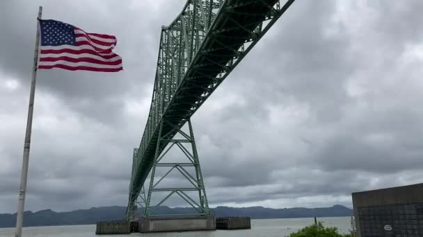 Stars Strips Flag Flies Riverfront Historic Huge Astoria Megler Bridge — Stockvideo