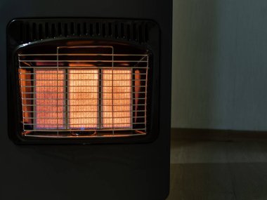 Infrared gas heater close up. Panel warmed up to working condition