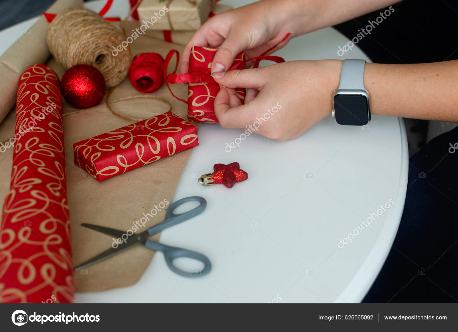 Girl hands wrapping New year gift, gift wrapping process, needlework,  creativity 14565728 Stock Photo at Vecteezy