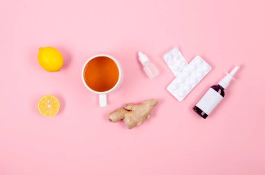 Medicines for treatment- pills, spray bottles, thermometer, Lemon, ginger and tea. traditional and folk methods of treatment. Pharmaceuticals and medicine. Illness concept. 